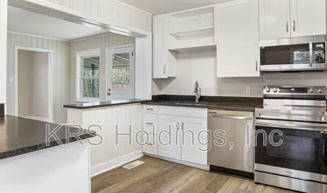 Building Photo - 1210 Downing Rd