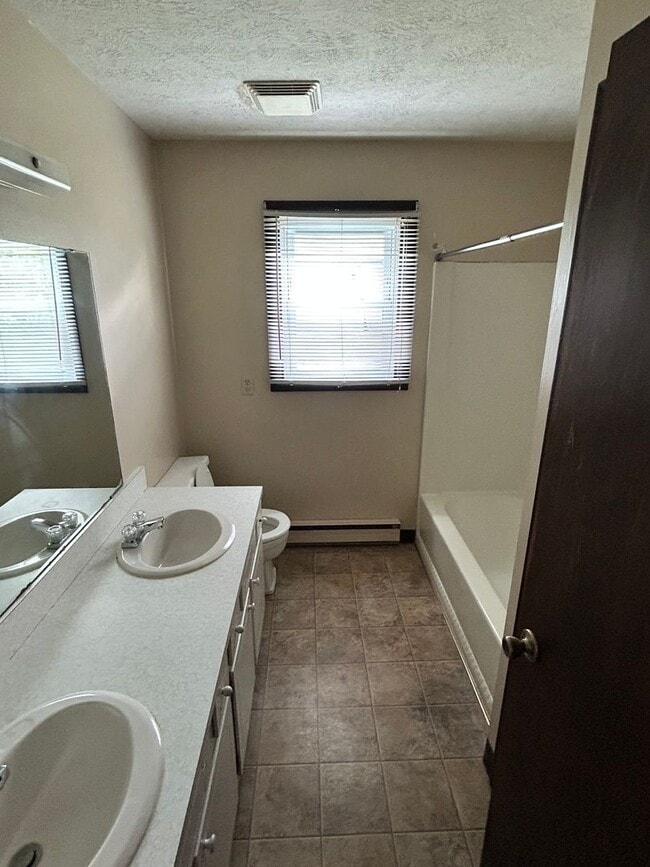 Building Photo - Two Bedroom - Duplex