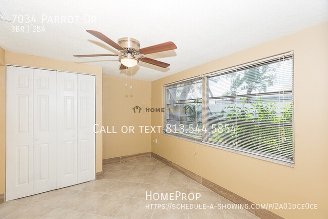 Building Photo - 7034 Parrot Dr