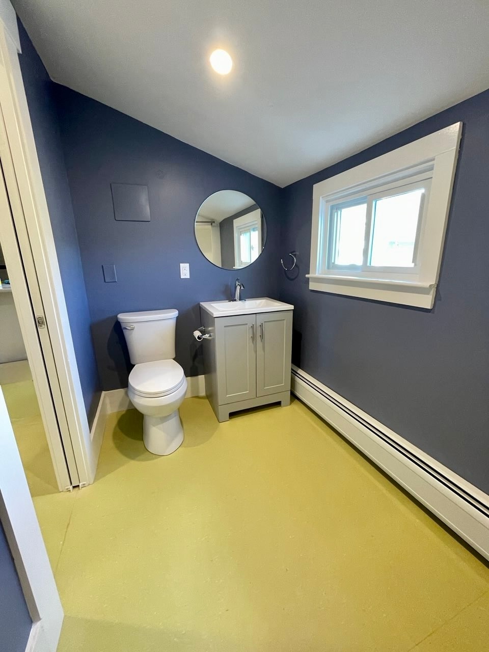 The half bath on the first floor is located off the laundry hall. - 20 Chapel St