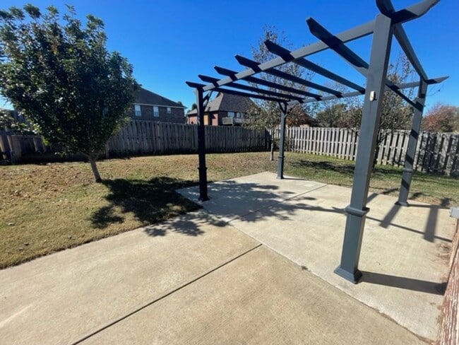 Building Photo - This Gorgeous All Brick and Stone Patio Ho...