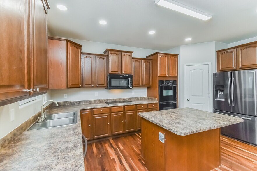 Building Photo - 7306 Running Deer Way