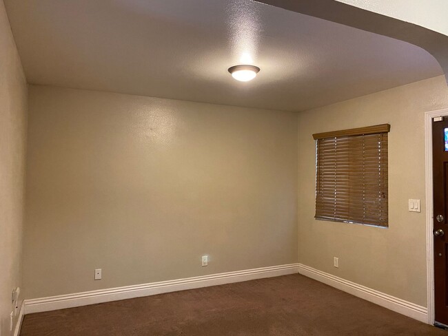 Building Photo - AFFORDABLE 1st Floor Condo & patio yard!