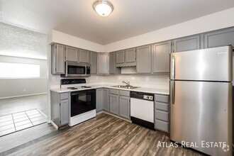 Building Photo - Look and lease: Free 50" TV if you apply 2...