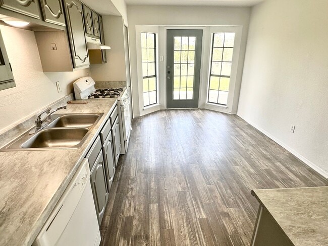 Building Photo - NEW IN MANAGEMENT - AVAILABLE NOW!