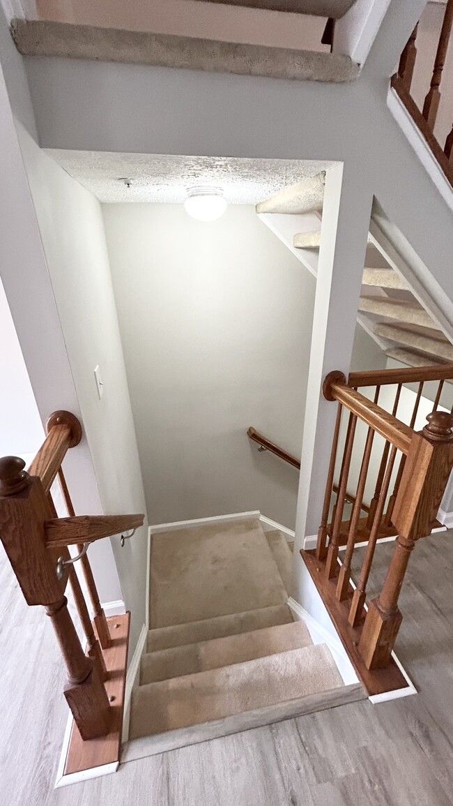 stair down to basement - 8018 Brightlight Pl