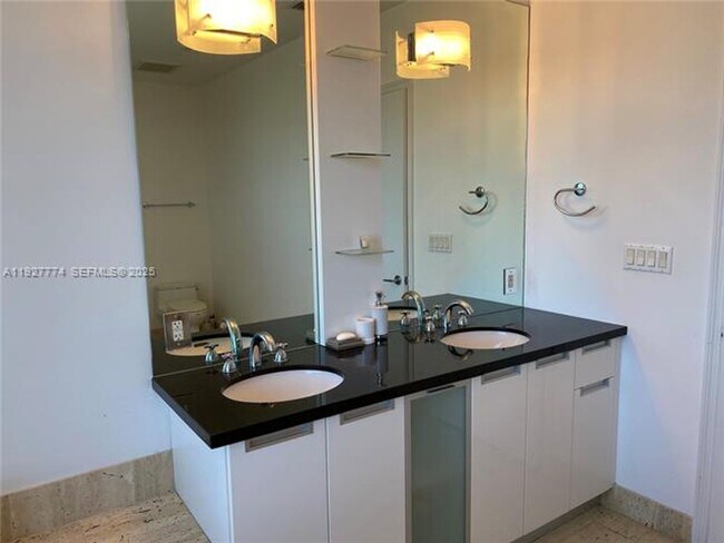 Building Photo - 7901 Hispanola Ave