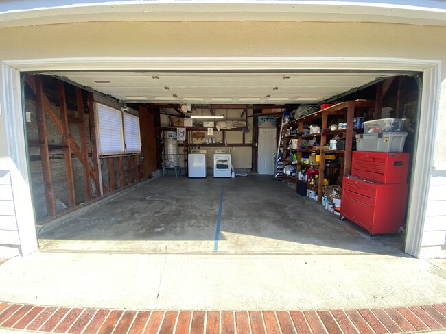 2 car garage with Washer/Dryer hook ups. - 21806 Redbeam Ave