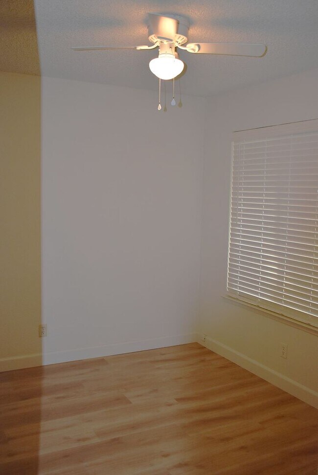 Building Photo - 4-bedroom home with luxury vinyl flooring and much more!