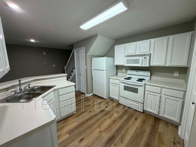 Building Photo - 6855 Woodland Ave