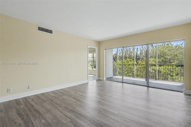 Building Photo - 3250 N Palm Aire Dr