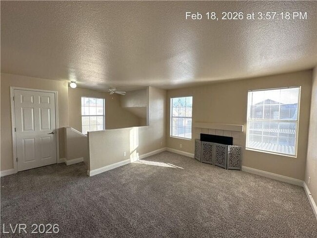 Building Photo - Bright Northwest Second-Floor Condo with Oversized Balcony & Community Pool!