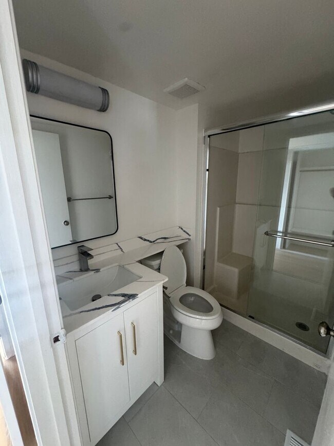 Building Photo - Beautifully Updated 2BD/2BA Condo | In-Unit Laundry, Garage & Greenbelt Views
