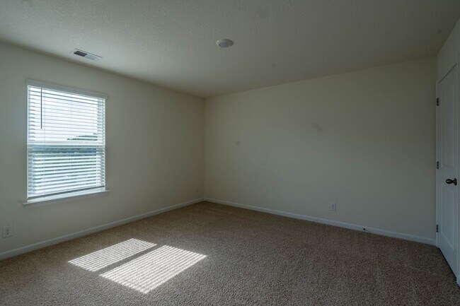 Building Photo - Newly built 3 bedroom and 2.5 bath home with garage.