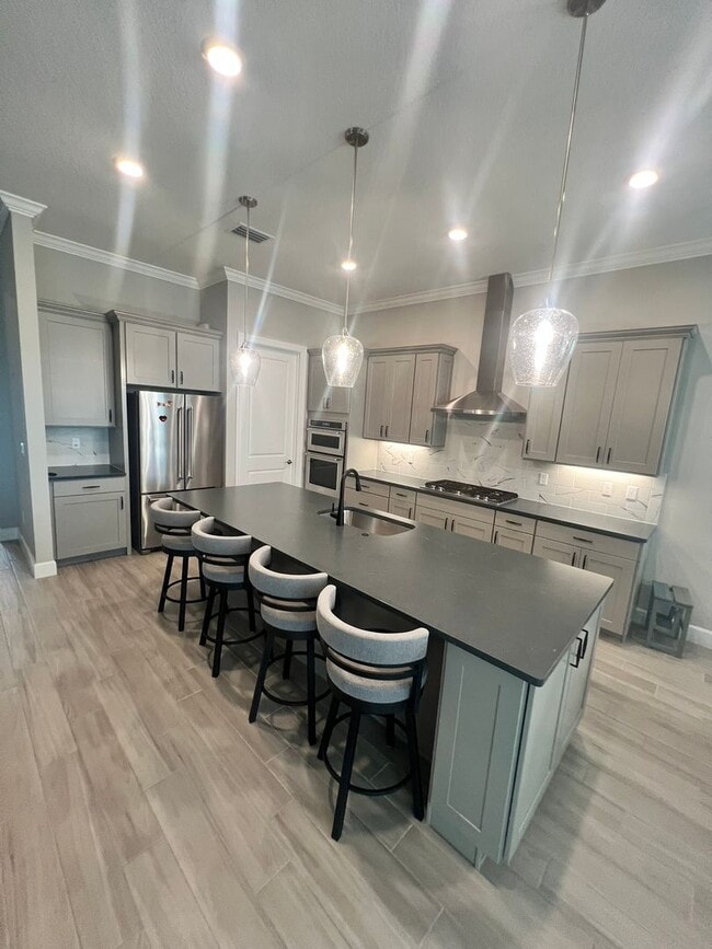 Building Photo - STUNNING LAKEFRONT 3 BEDROOM, 2.5 BATH HOM...