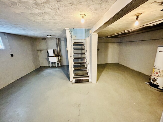 Unfinished basement with washer dryer hookups - 717 Koogler St