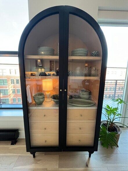 Stunningly beautiful cabinet from Anthropologie houses a gorgeous set reactive glaze dishes and glas - 383 Commercial St