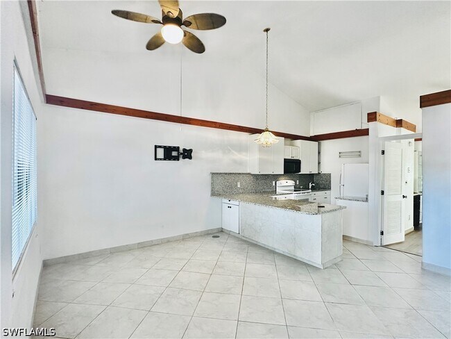 Building Photo - 826 Wiggins Pass Rd
