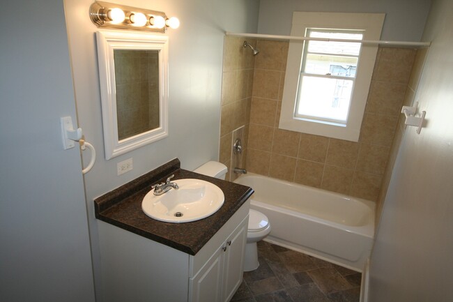Building Photo - Your Own Home and Yard Centrally Located 3...