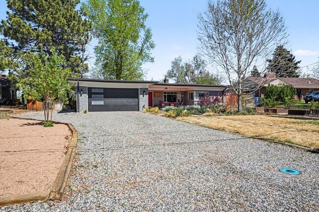 Building Photo - Sunlit Wheat Ridge Gem with Huge Wooded Backyard