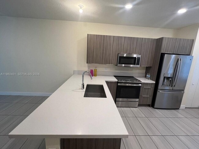 Building Photo - 6416 NW 102nd Ct