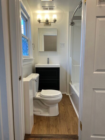 The full bathroom is located at the top of the stairs. - 126 Merion Ave