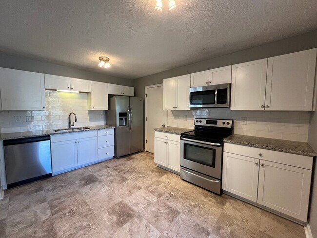 Building Photo - Charming Renovated 4 Bedroom Home