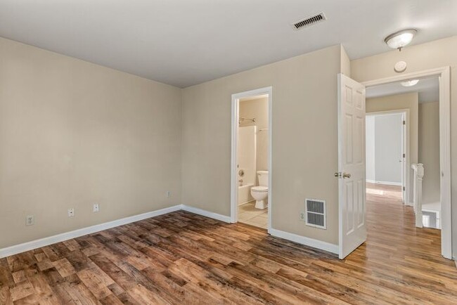 Building Photo - TH in UNCG Area, Laminate Wood Flooring, A...