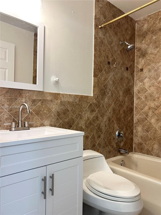 Building Photo - 6452 Royal Palm Beach Blvd