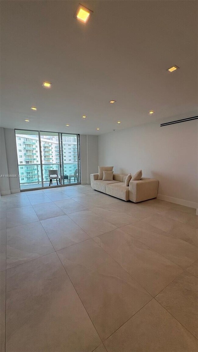 Building Photo - 19390 Collins Ave