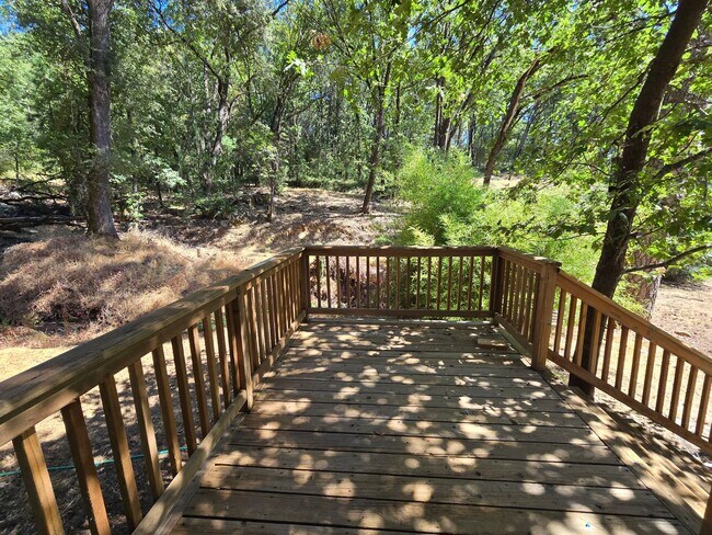 Building Photo - charming 3-bedroom, 2-bathroom home with l...
