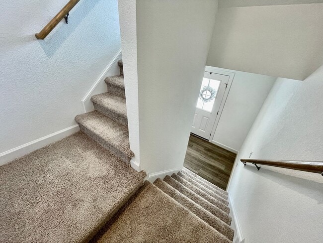 Building Photo - Practically New & Available NOW! Americana Luxury Townhomes! Pet Friendly! Attached Garage! All A...