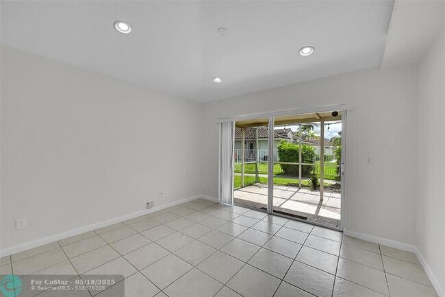 Building Photo - 5642 NW 118th Dr