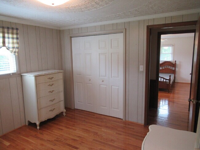 Building Photo - Charming All-Brick Ranch with Finished Bas...