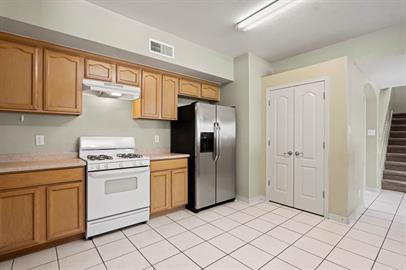 Building Photo - Large 2 story home with refrigerated air, huge backyard and Pets are Allowed.