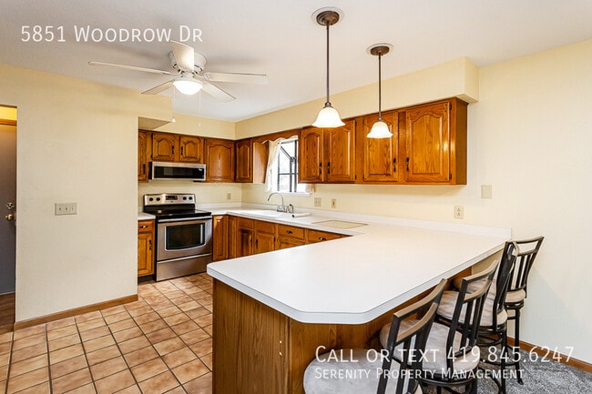 Building Photo - 5851 Woodrow Dr