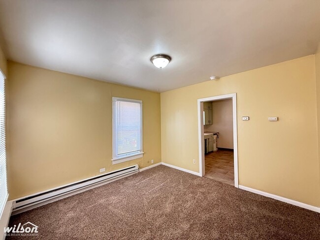 Building Photo - 2-Bedroom House with Fenced Yard & Parking!