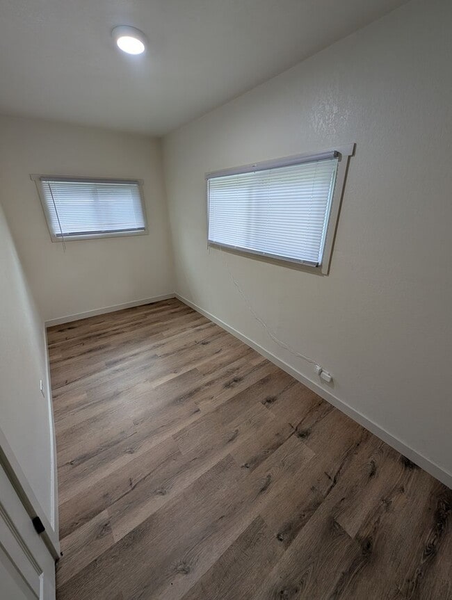 Building Photo - Adorable Four Bedroom w/ Fenced Yard Avail...