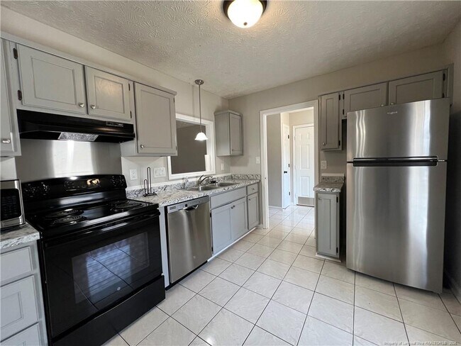 Building Photo - 7126 Kearny Ave