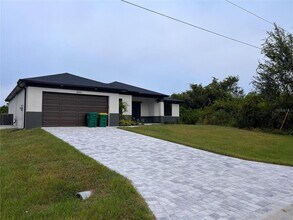 Building Photo - Be the first in occupy this 2025 constructed home in the vibrant city of Port Charlotte, FL! Qual...