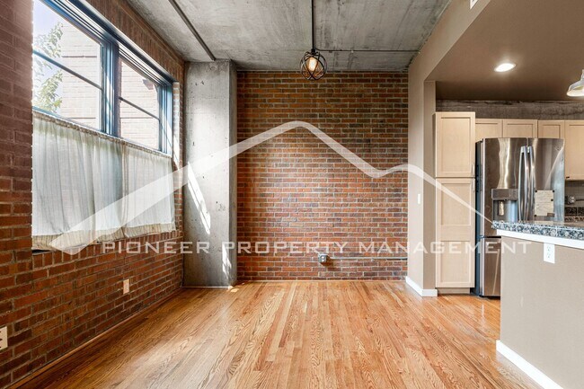 Building Photo - Modern Industrial Condo Downtown with Park...