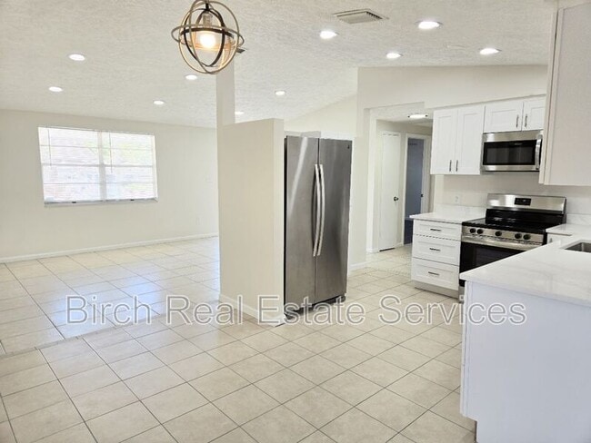 Building Photo - 6448 Reno Ave