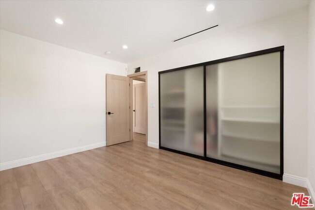 Building Photo - 11700 Woodley Ave