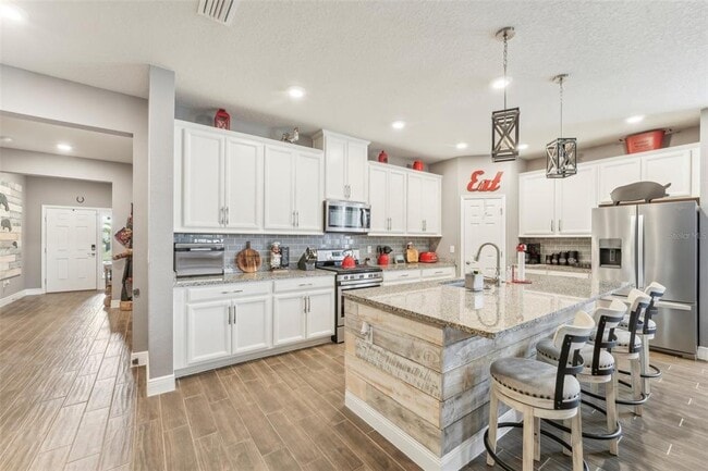 Building Photo - 6028 Milestone Dr