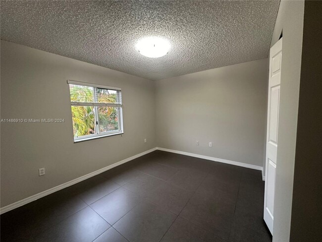 Building Photo - 10790 NW 52nd St
