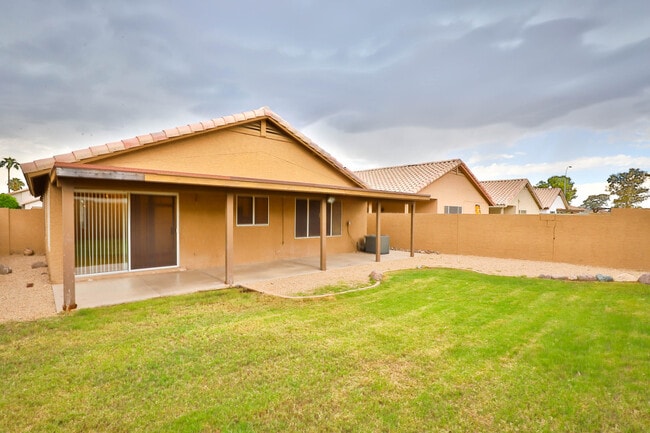 Building Photo - 8438 W Charter Oak Rd