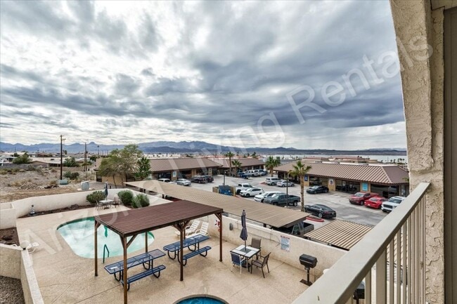 Building Photo - CONDO WITH POOL AND GARAGE
