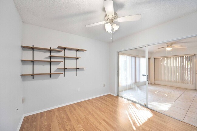 Building Photo - Beautiful Must See!! 3/2 Plus Sunroom & Garage!!  Gated Community!!