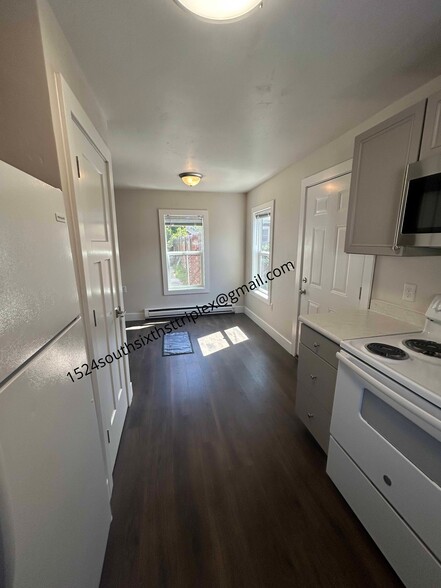 Kitchen to dining area - 1524 S 6th St W