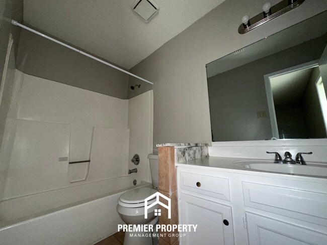 Building Photo - Charming 3BR/2BA in Country Brook | Vaulted Ceilings, Fireplace & Fenced Yard